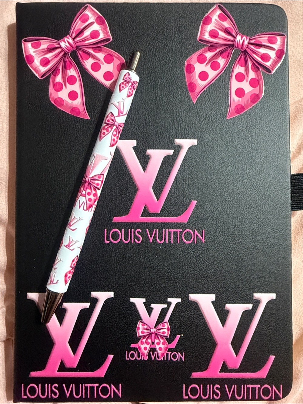 Black & pink journal with matching pen.